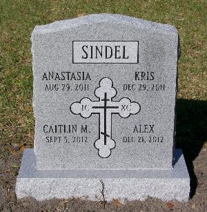 infant granite upright headstone with orthodox cross